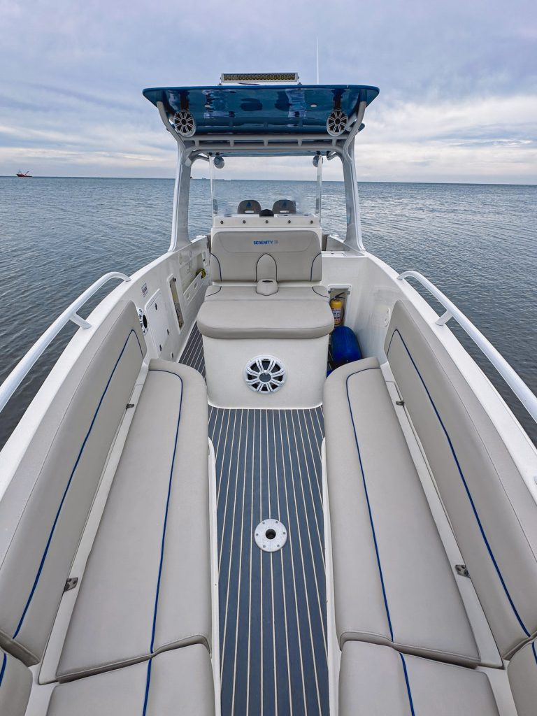 Deck and console of the Serenity II motorboat.