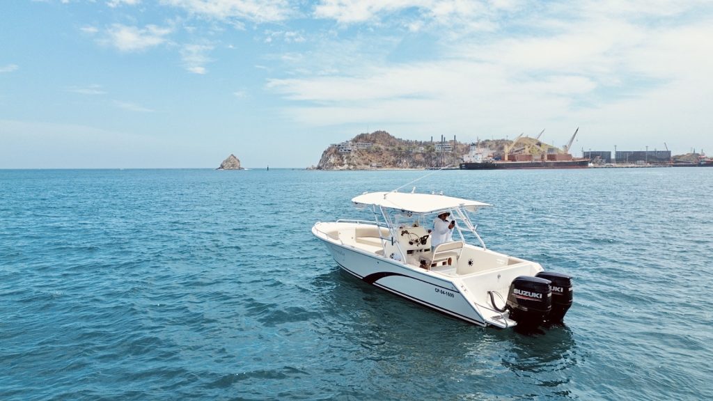 A boat sailing in Taganga Bay.