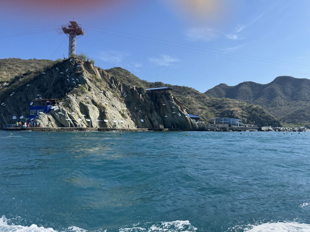 Lighthouse on the rocks off the coast of Santa Marta.